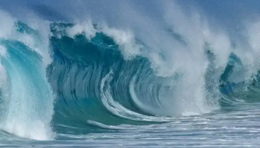 depositphotos_492511100-stock-photo-large-splashing-wave-pacific-ocean